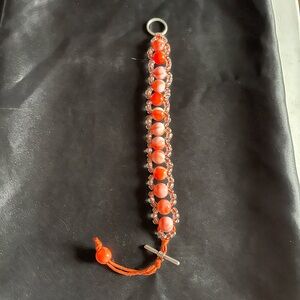 Handmade Beaded Bracelet with Orange Accents